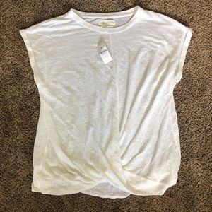 white tee shirt with twist
